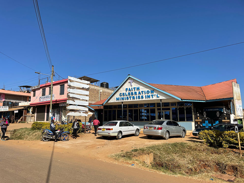 The image shows a street scene with a building labeled 'Path to Salvation Ministry' in the background, and there's a sign that reads 'PATH TO SALVATION MINISTRY' on the side of the road.